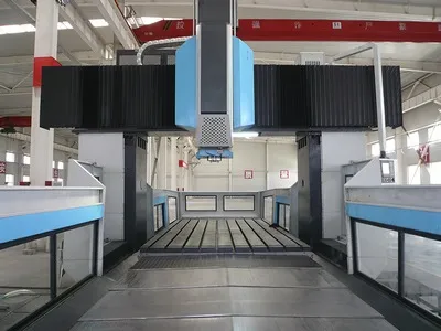 Фрезерно-расточный станок портального типа (неподвижная траверса, подвижный стол)